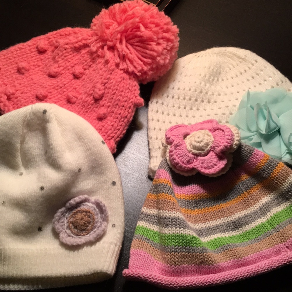 Set of 4 knit hats for baby girl